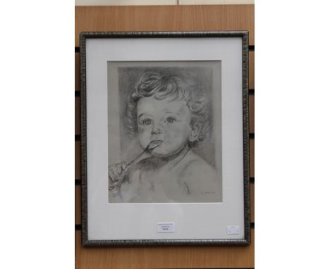 G. Ward, a head and shoulders portrait of an infant, pencil/pastel, signed and dated 1944, framed, 31 cm by 25 cm