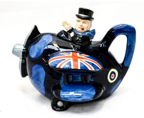 A Carlton ware Churchill teapot, aeroplane with Winston in the cockpit, Union flag wings 