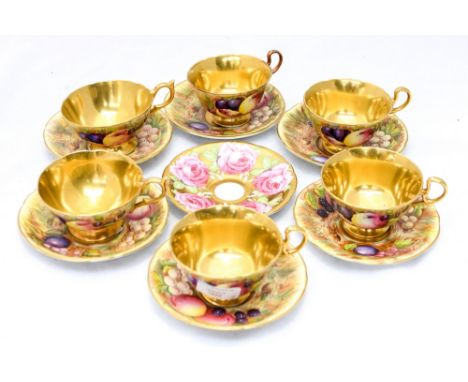 An Aynsley 'Orchard Gold' six piece set of cups and saucers pattern No C766 (12) 