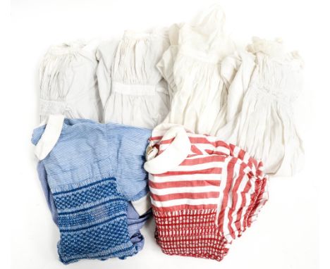 Two children's smocked dresses, one blue cotton early 1950s, the pink striped one has an early metal zip, three cotton vintag