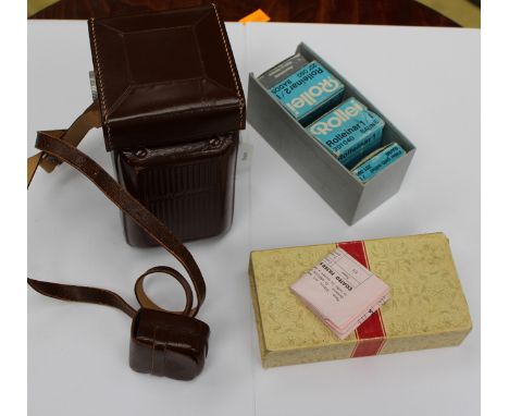 A  vintage Rolleicord camera with filters and accessories 