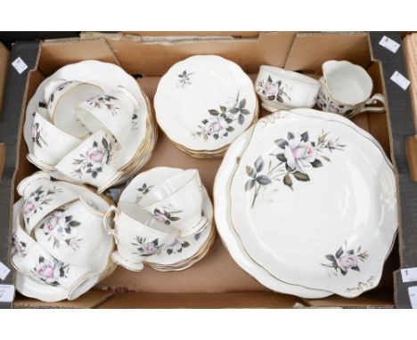 An extensive Royal Albert 'Queens Messenger', tea and dinner service including twelve dinner plates, side plates, saucers and