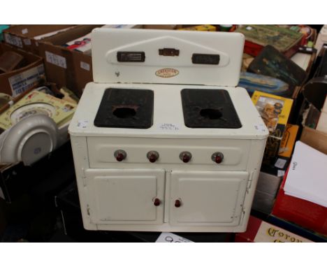 AMERSHAM TOY'S "Made in England" child's early 20th Century tinplate stove, with kettle, saucepan and two trays.

