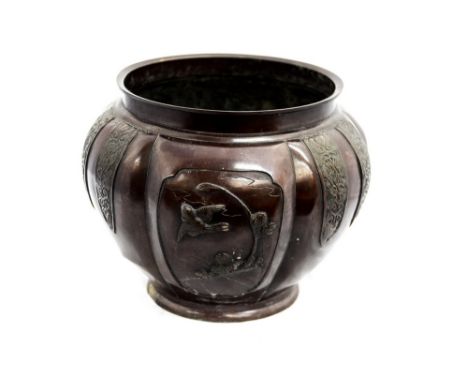 A Japanese Meiji bronze jardinaire