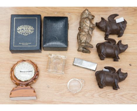 Cast brass bear money box, three iron 'Pigs Might Fly' figures metal 'stamp' box and a boxed hip flask, glass ink well and an