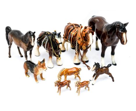 Nine ceramic animals to include horses and an Alsatian, some Beswick (9) 