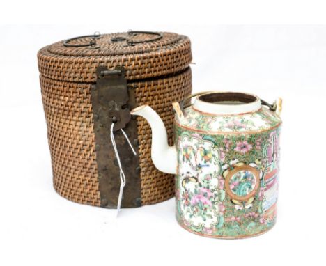A Famille Rose teapot in basket 