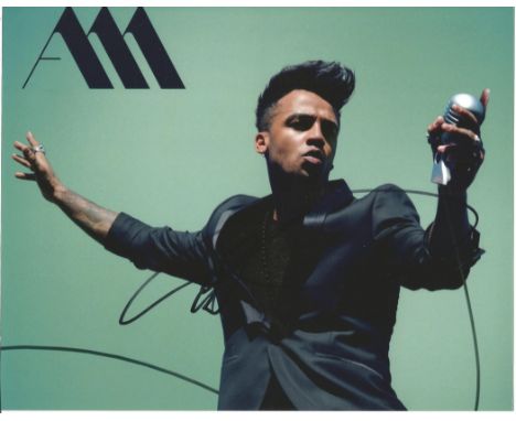 Singer Aston Merrygold signed 10x8 colour photo in excellent condition. Aston Iain Merrygold is an English singer, dancer, te