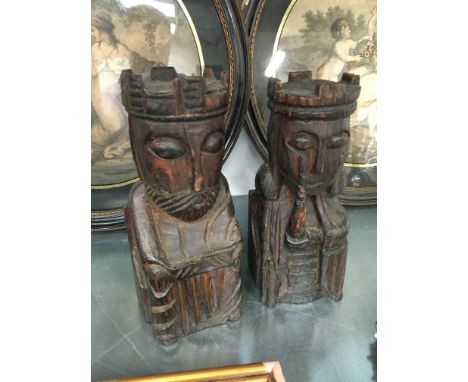 A pair of oak carved chess pieces: King and Queen.
