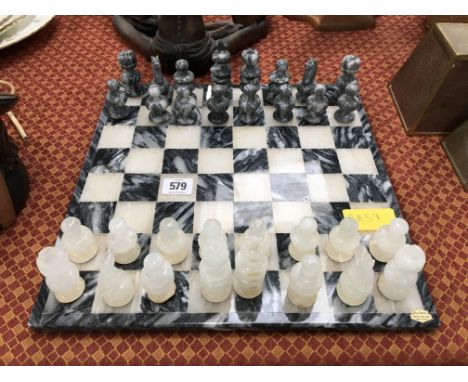 An onyx chess set and board.