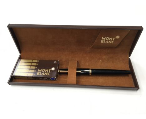 A vintage Mont Blanc cartridge filling fountain pen with 585 semi flex nib, presented in a Mont Blanc box with extra cartridg