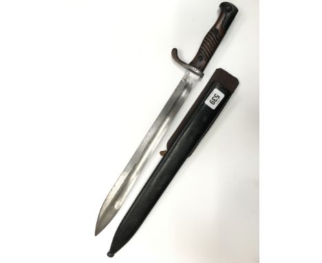 A WWI 1916 German Simson & Co. Suhl bayonet in black painted metal scabbard (impressed marks to blade), (36.5cm blade).