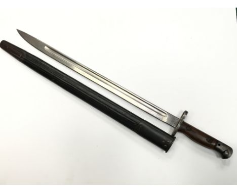 A WWI British pattern 1907 Sanderson bayonet and scabbard, 1918 dated with black leather scabbard, impressed marks to lower b