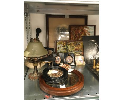 A circular mahogany framed mirror together with various pictures and prints, brass trivet, motor horn and lamp.