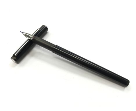 A Mont Blanc Noblesse fountain pen in black with clear 14 carat white gold nib.