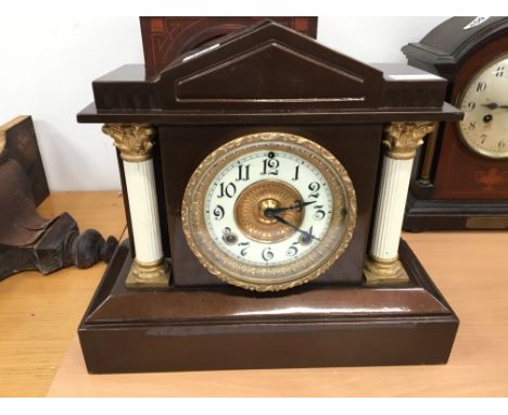 A late 19th century metal cased architectural mantle clock.