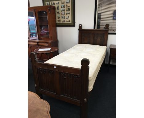 A pair of Lincolnshire oak linen fold panelled and carved back 3' headboards and footboards, twin beds,  with side rails, bac