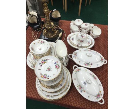 The residue of an extensive Mintons bone china dinner and tea service, decorated in the Marlow pattern.