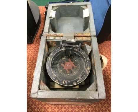 A WWII hand held Military compass in original grey painted box.
