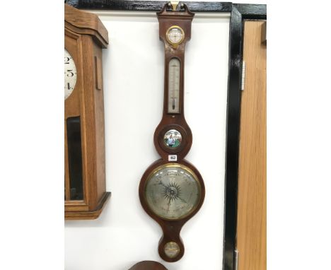 An early Victorian mahogany and line inlay wheel barometer by Cattanic and Co, York