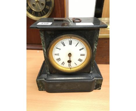 A late 19th century slate and marble cased mantle clock.