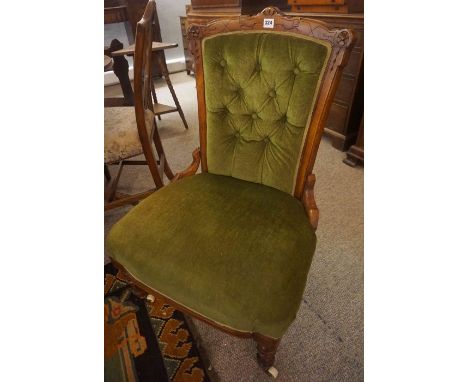 Victorian Mahogany Nursing Chair, Upholstered in later green velour, raised on ceramic castors, 88cm high