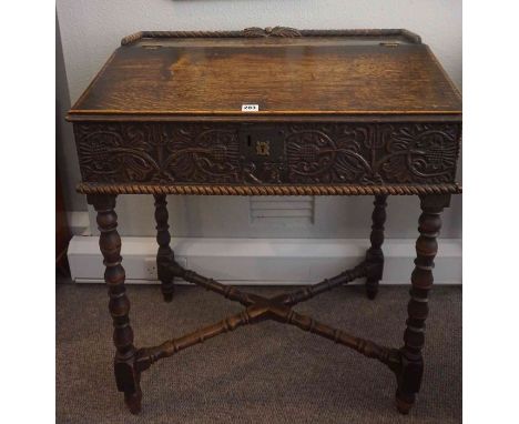 Charles II Oak Writing Desk, circa late 17th century, Probably of Scottish origin, Having a writing flap above a carved friez