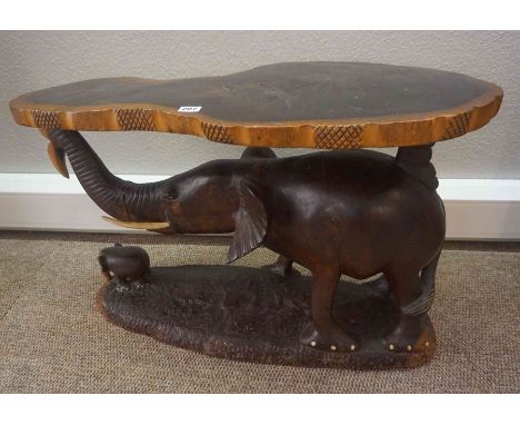 African Style Hardwood Elephant Table, Having tusks, 48cm high, 85cm wide, 47cm deepCondition reportTwo deep cracks to the tr