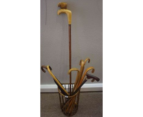 Nine Assorted Walking Sticks, In a stick stand, (10)