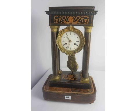 French Empire Mantel Clock, circa 19th century, Having four pillars, decorated with ormolu type mounts, with pendulum, 40cm h