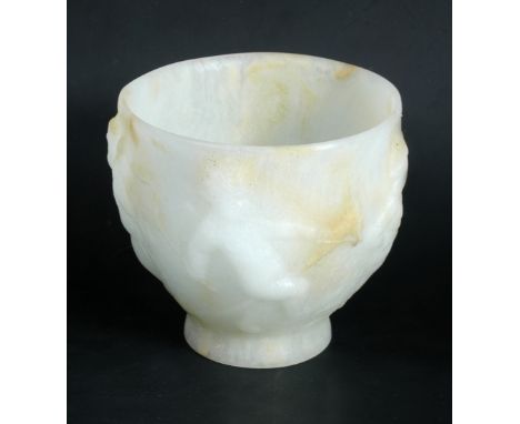 François-Emile Décorchemont, a rare pâte de verre glass coupe, the white jade coloured body with dancing putti, seal mark in 