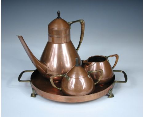 A W.M.F copper plated tin Turkish coffee set, comprising coffee pot and cover, milk jug and sugar basin and cover with wicker