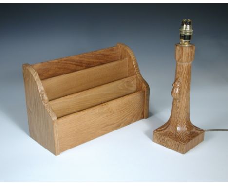 A Robert 'Mouseman' Thompson oak lamp base, the octagonal column with carved mouse signature raised on a square plinth base 2