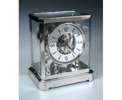 A Le Coultre Atmos clock, later Rhodium plated, the fifteen jewel 519 calibre single train movement wound via the expansion a