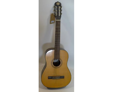 A vintage acoustic guitar 