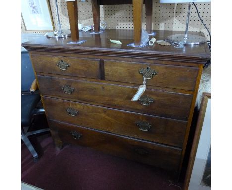 A 19th century oak chest of two short over three long drawers, raised on bracket feet, (missing one handle), H.100 W.115 D.57