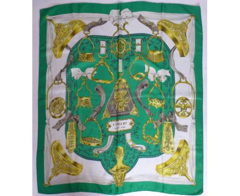 A vintage Hermes silk scarf in green, white and gold entitled 'Etriers', circa 1970's, Designer: Francoise De La Perriere, 90