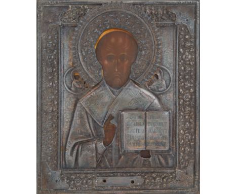 A RUSSIAN ICON OF ST. NICHOLAS WITH SILVER REPOUSSE OKLAD, 1893depicting a chest-length St. Nicholas the Wonderworker wearing