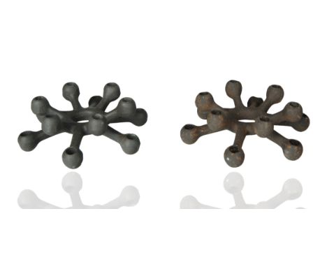 A PAIR OF MID-CENTURY IRON DANSK CANDLE-HOLDERSpair of iron small twelve light candle holders, each stamped with DANSK DENMAR