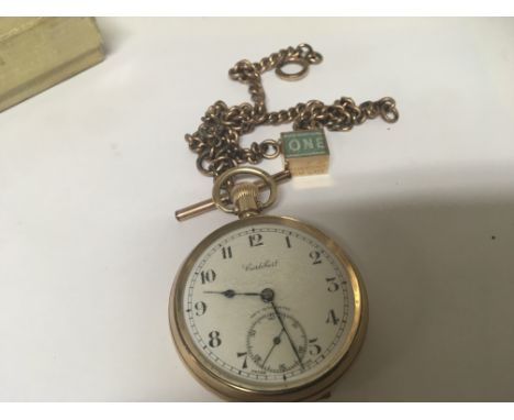A 9carat gold button wind open faced pocket watch seen working with engraved inner gold back plate and attached gold plated w
