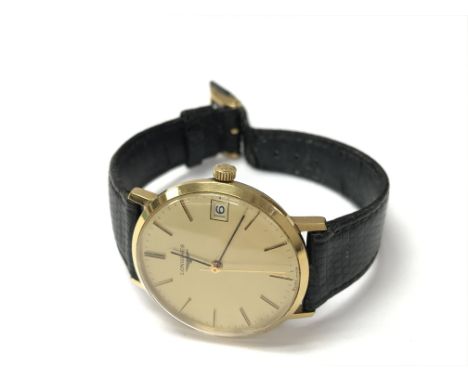 A gold plates Longines wrist watch.