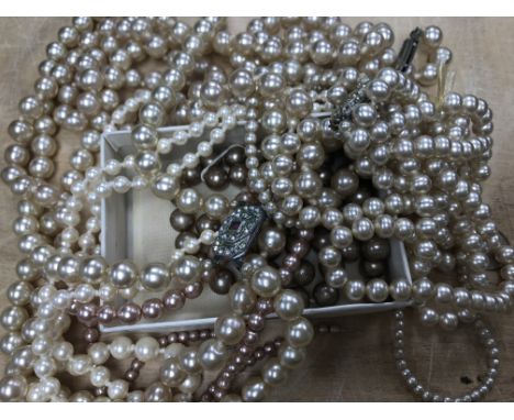 A small collection of simulated Pearl necklaces