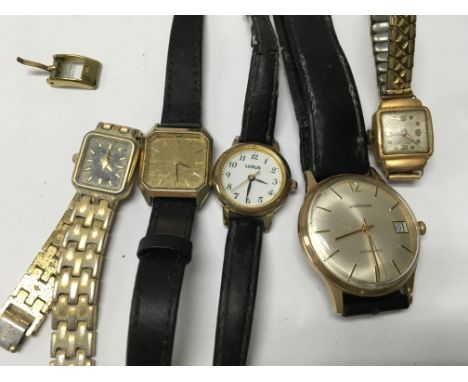 A collection of five dress watches including garrard. And 18 k cased watch .