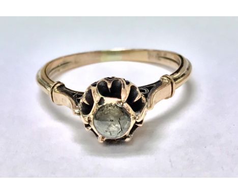 A vintage style 8ct rose gold rose cut diamond solitaire ring. The diamond is approximately 0.3ct and the ring size is approx