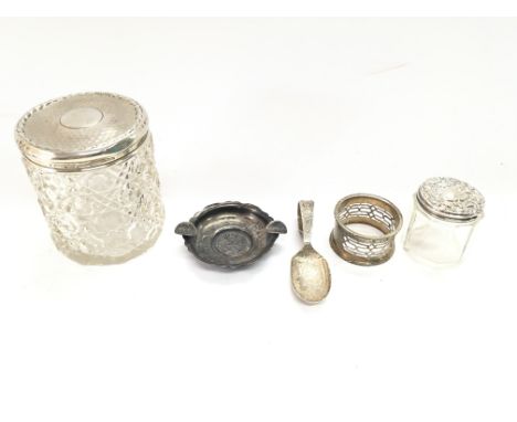 Collection of various silver items including a hallmarked spoon and vintage ashtray.