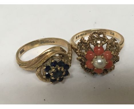 Two 9carat gold rings set with pearl and coral the other set with sapphire . Weight 6.5g