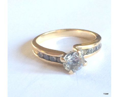 A 9ct gold ladies solitaire ring size m