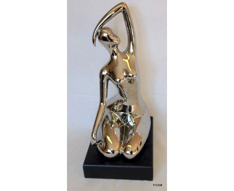 A Ceramic Art Deco Style Figure of a Young Lady