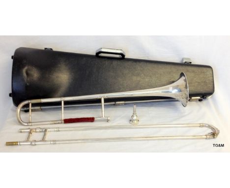 A cased Class A ex Salvation Army white metal trombone