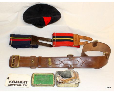 A leather Sam Browne belt with two British Army stable belts a beret and a Survival Kit
